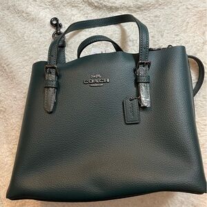 Coach Mollie Tote Bag - forest green with mustard center zip pocket.